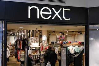 Illustration for article titled Next benefits from late Christmas shopping but warns on profits